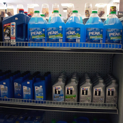 Shelf at convenience shop near El Rio East, Oxnard CA with a variety of auto supplies.