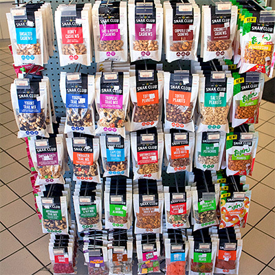A variety of nuts and trail mixes available to buy at our Orchard Park Snack Mart.
