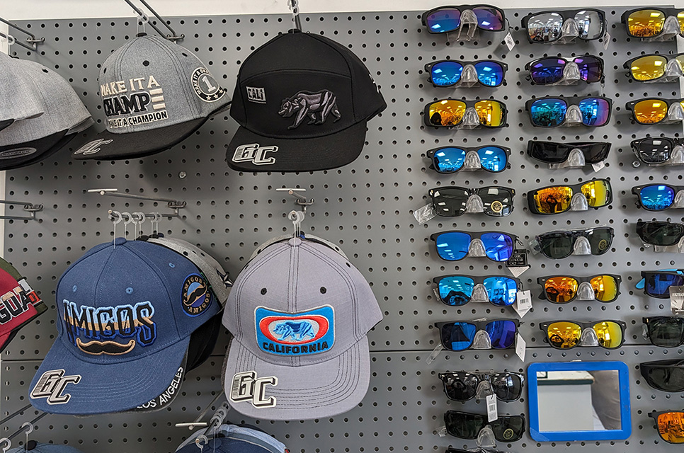 Hats and sunglasses for sale, some of our Carriage Square, Oxnard summer essentials.